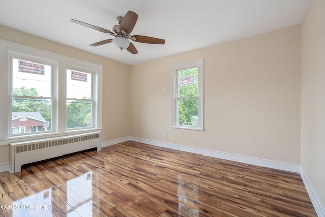 1707 Helderberg Trl, Berne, NY 12023 - empty room with radiator, wood finished floors, and a ceiling fan