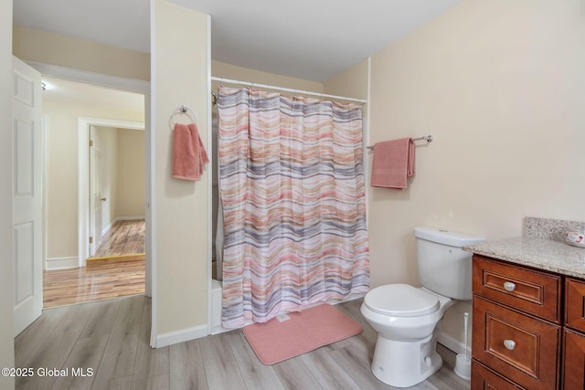 1707 Helderberg Trl, Berne, NY 12023 - bathroom with wood finished floors, vanity, and curtained shower