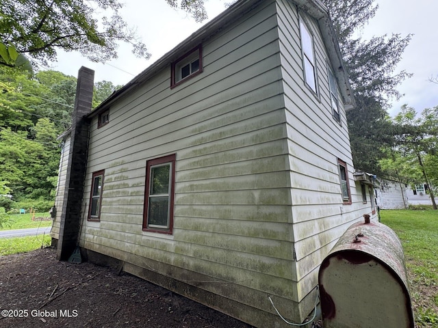 114 State Route 146, Wright, NY 12157 - view of side of home featuring a chimney