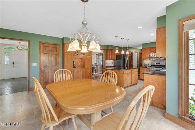630 Salvia Ln, Guilderland, NY 12303 - dining space with a chandelier and recessed lighting