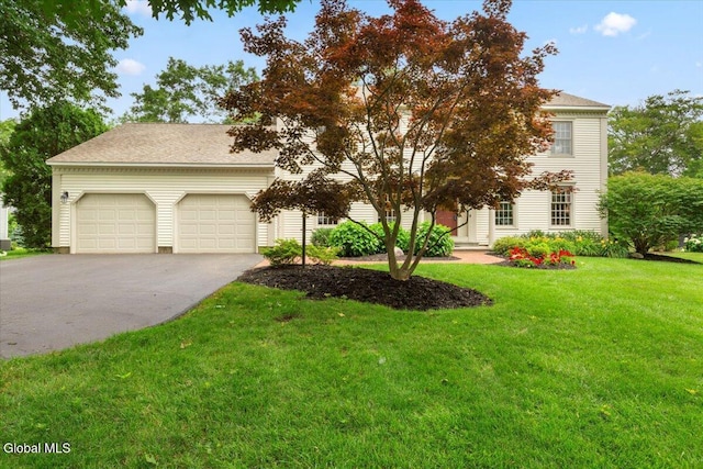 630 Salvia Ln, Guilderland, NY 12303 - view of front of property featuring driveway, a garage, and a front lawn