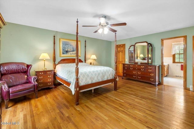 630 Salvia Ln, Guilderland, NY 12303 - bedroom with wood finished floors, connected bathroom, and ceiling fan