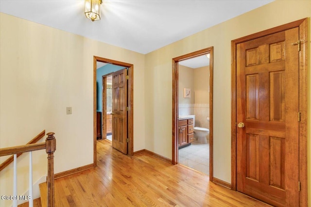 630 Salvia Ln, Guilderland, NY 12303 - corridor featuring light wood finished floors and an upstairs landing