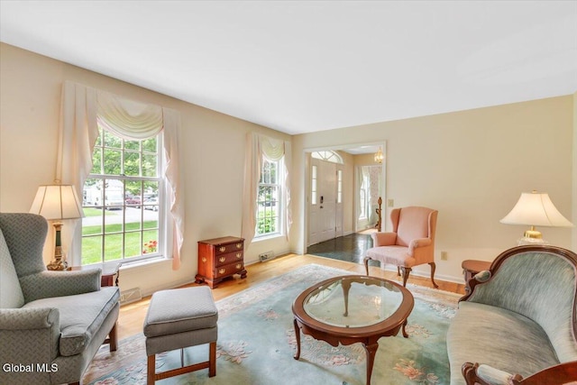 630 Salvia Ln, Guilderland, NY 12303 - living area featuring wood finished floors and baseboards