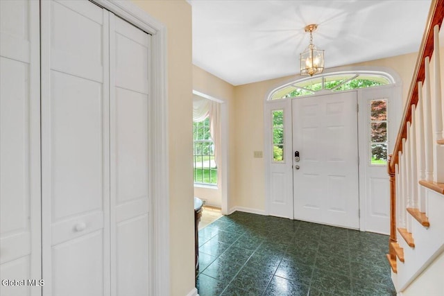 630 Salvia Ln, Guilderland, NY 12303 - entrance foyer with stairway and a chandelier