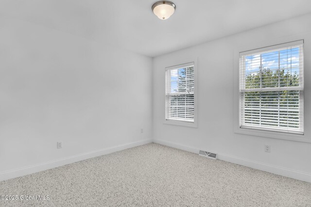 21 Beacon Dr, Colonie, NY 12189 - carpeted spare room with baseboards