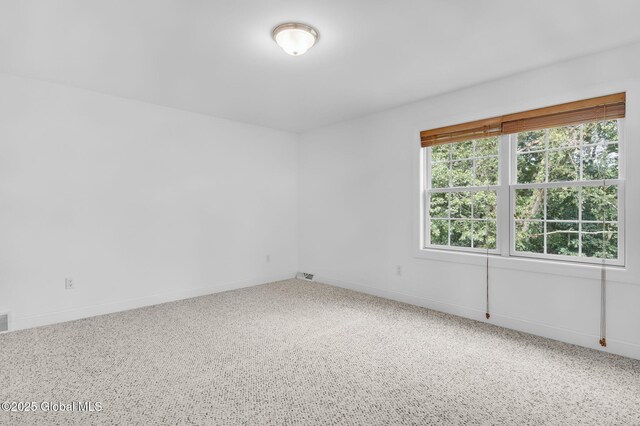 21 Beacon Dr, Colonie, NY 12189 - carpeted empty room with baseboards