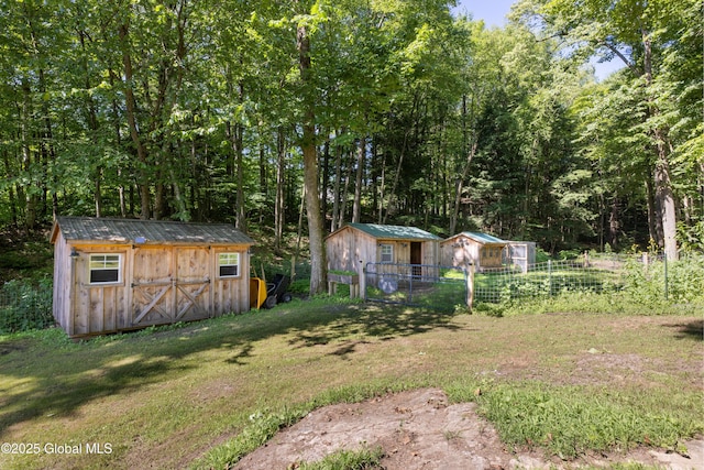 345 Goodman Rd, Fort Ann, NY 12827 - view of yard with a storage shed and a forest view