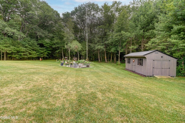 2794 W Lydius St, Schenectady, NY 12306 - view of grassy yard with a shed and a forest view