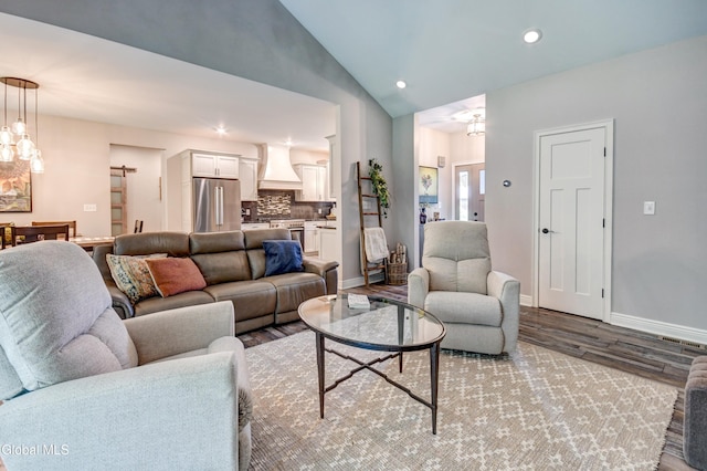 2794 W Lydius St, Schenectady, NY 12306 - living area with wood finished floors, vaulted ceiling, recessed lighting, and a chandelier