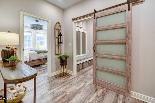 2794 W Lydius St, Schenectady, NY 12306 - hallway with a barn door and wood finished floors