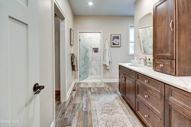 2794 W Lydius St, Schenectady, NY 12306 - bathroom with a marble finish shower, wood finished floors, vanity, and recessed lighting
