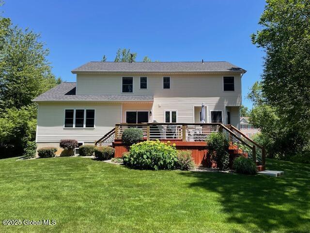 6 Patroon Way, Halfmoon, NY 12065 - rear view of house with a lawn, a deck, and stairs