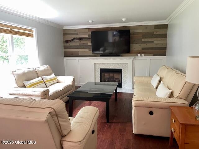 6 Patroon Way, Halfmoon, NY 12065 - living room featuring ornamental molding, wood finished floors, a fireplace, and an accent wall