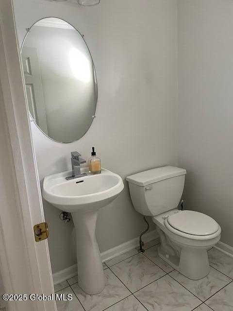 6 Patroon Way, Halfmoon, NY 12065 - half bath featuring toilet and marble look tile flooring