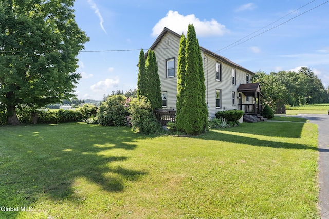 2289 Hickory Hill Rd, Mohawk, NY 12068 - view of side of home featuring a lawn