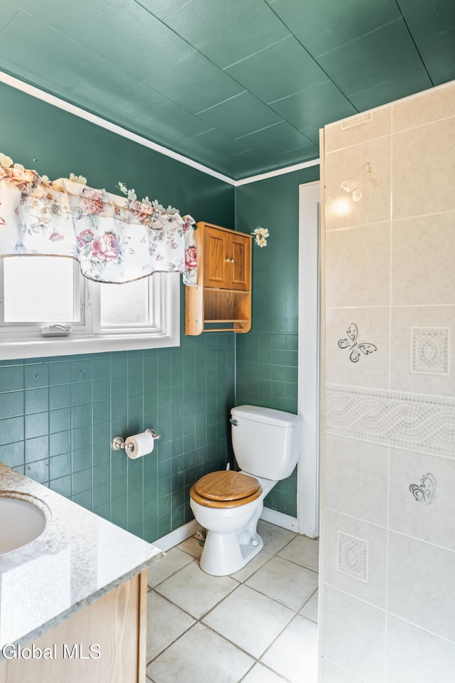 2289 Hickory Hill Rd, Mohawk, NY 12068 - bathroom with tile patterned flooring, tile walls, and vanity