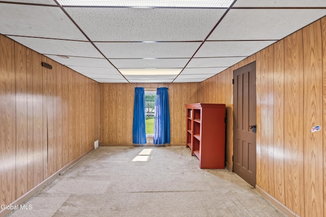2289 Hickory Hill Rd, Mohawk, NY 12068 - spare room with a drop ceiling, wood walls, and light carpet