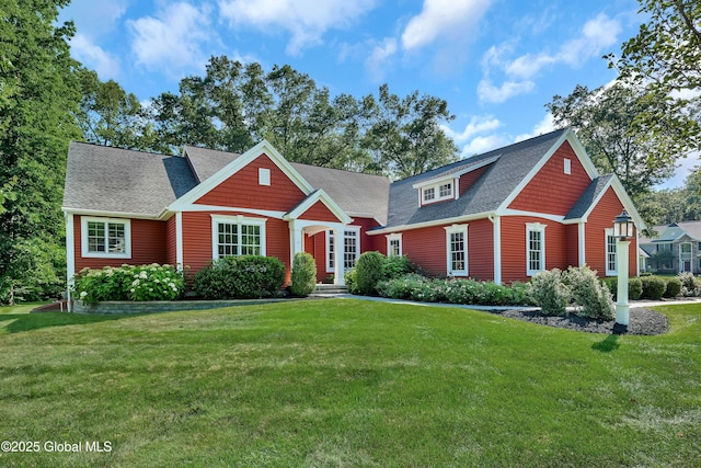 13 Bridlewood Loop, Clifton Park, NY 12148 - craftsman-style home featuring a front yard and roof with shingles