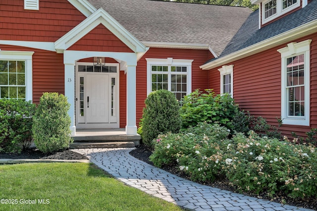 13 Bridlewood Loop, Clifton Park, NY 12148 - view of exterior entry featuring a shingled roof