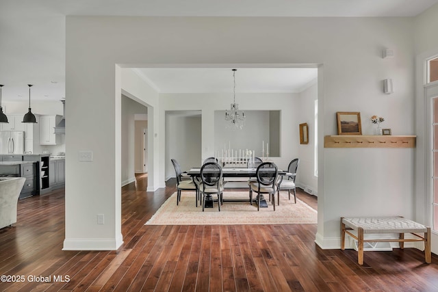 13 Bridlewood Loop, Clifton Park, NY 12148 - dining area featuring a chandelier, dark wood-style floors, and ornamental molding