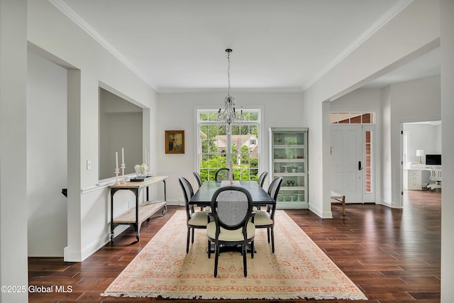 13 Bridlewood Loop, Clifton Park, NY 12148 - dining area with a chandelier, crown molding, and dark wood finished floors