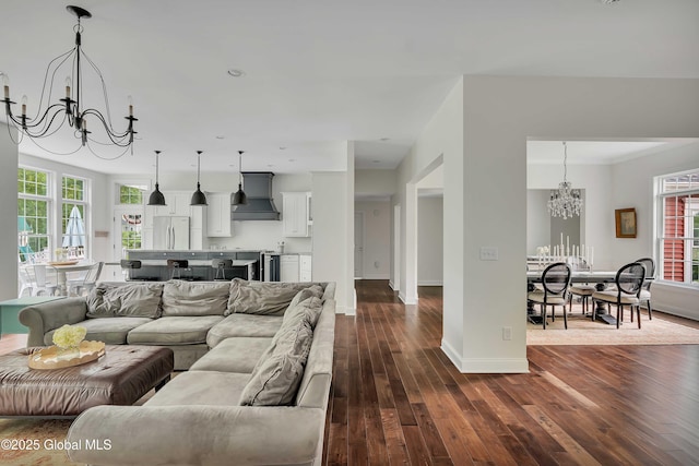 13 Bridlewood Loop, Clifton Park, NY 12148 - living room featuring a chandelier, dark wood-style flooring, plenty of natural light, and recessed lighting