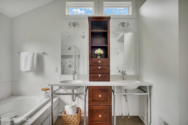 13 Bridlewood Loop, Clifton Park, NY 12148 - full bathroom with a shower stall, a bath, double vanity, and wood finished floors