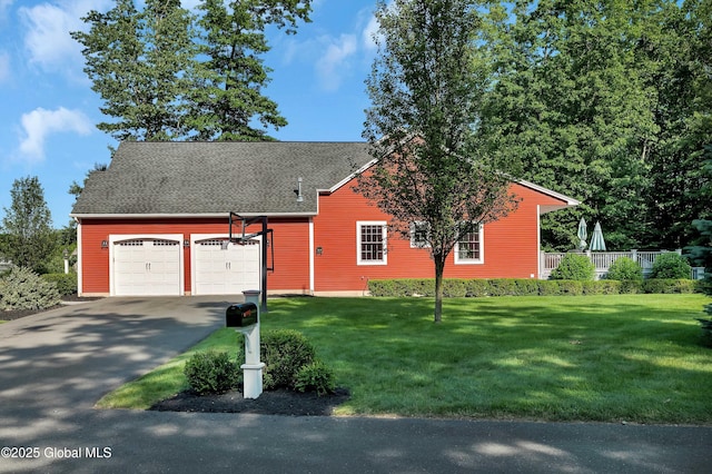13 Bridlewood Loop, Clifton Park, NY 12148 - view of front of home with an attached garage, a front lawn, driveway, and a shingled roof