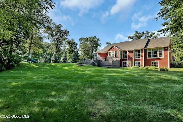 13 Bridlewood Loop, Clifton Park, NY 12148 - view of grassy yard featuring a wooden deck