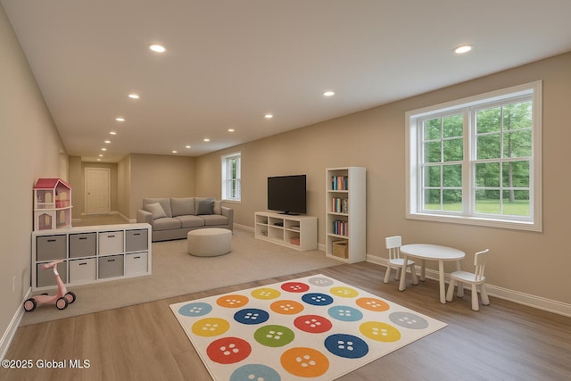 13 Bridlewood Loop, Clifton Park, NY 12148 - playroom with wood finished floors and recessed lighting