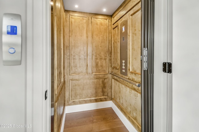 606 Vly Pointe Dr, Niskayuna, NY 12309 - elevator featuring wood finished floors and recessed lighting
