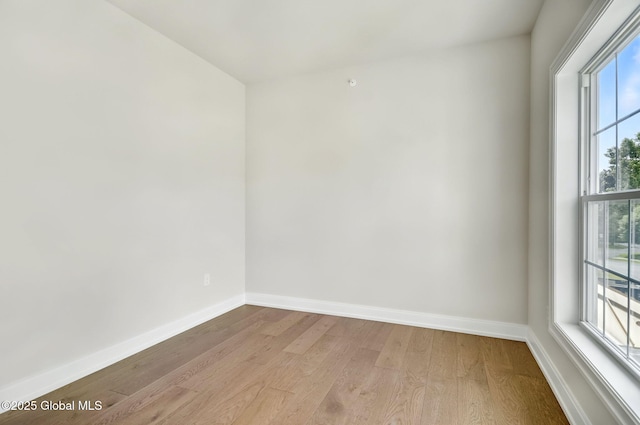606 Vly Pointe Dr, Niskayuna, NY 12309 - empty room featuring wood finished floors