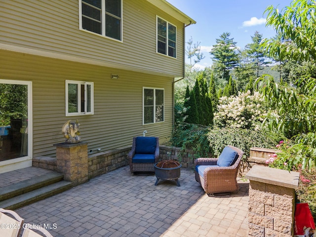 13 Macory Way, Moreau, NY 12831 - view of patio featuring an outdoor fire pit