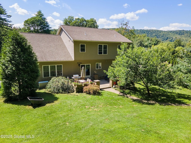 13 Macory Way, Moreau, NY 12831 - rear view of property with a lawn and roof with shingles