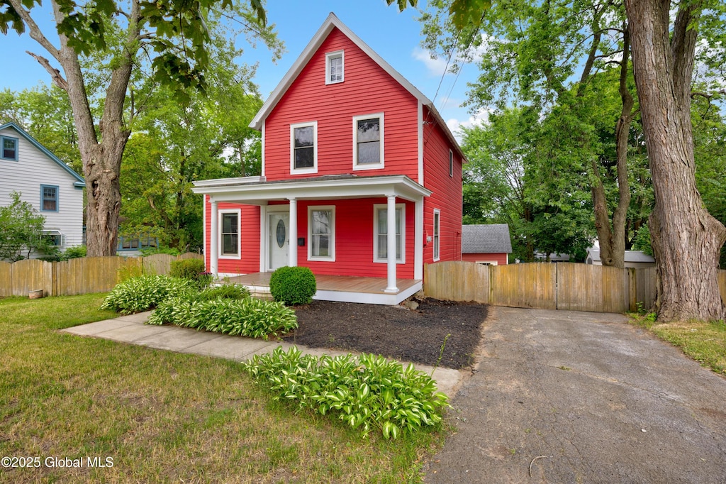 1147 Van Antwerp Rd, Niskayuna, NY 12309 - view of front of house featuring covered porch and asphalt driveway