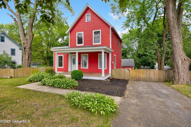 1147 Van Antwerp Rd, Niskayuna, NY 12309 - view of front of house featuring covered porch and asphalt driveway