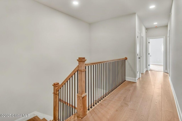 602 Vly Pointe Dr, Niskayuna, NY 12309 - corridor with an upstairs landing, recessed lighting, and wood finished floors