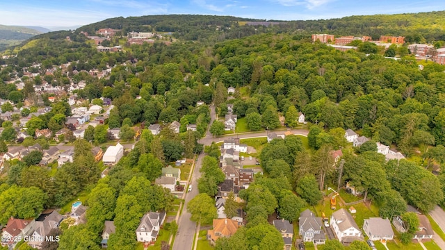31 Cedar St, Oneonta, NY 13820 - aerial overview of property's location with a heavily wooded area