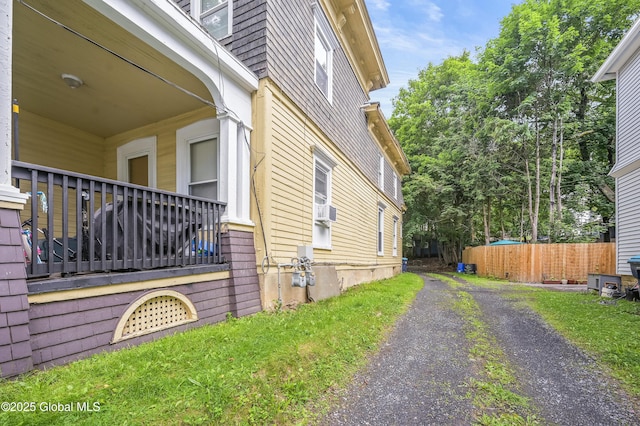 31 Cedar St, Oneonta, NY 13820 - view of side of property featuring driveway and cooling unit
