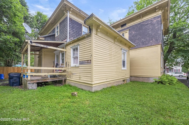 31 Cedar St, Oneonta, NY 13820 - rear view of property featuring a wooden deck