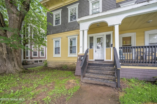 31 Cedar St, Oneonta, NY 13820 - doorway to property with covered porch