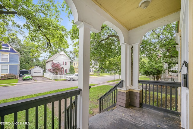 31 Cedar St, Oneonta, NY 13820 - wooden porch with a residential view