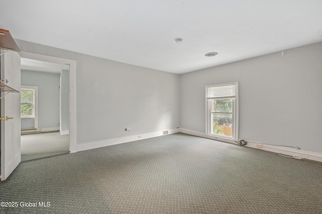 31 Cedar St, Oneonta, NY 13820 - carpeted empty room featuring plenty of natural light and a smoke detector