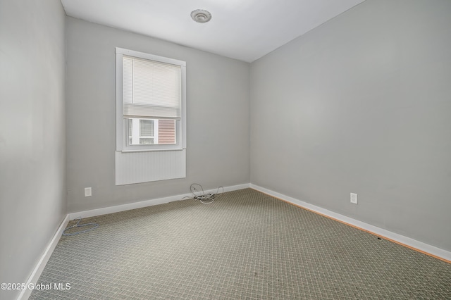 31 Cedar St, Oneonta, NY 13820 - carpeted spare room featuring baseboards