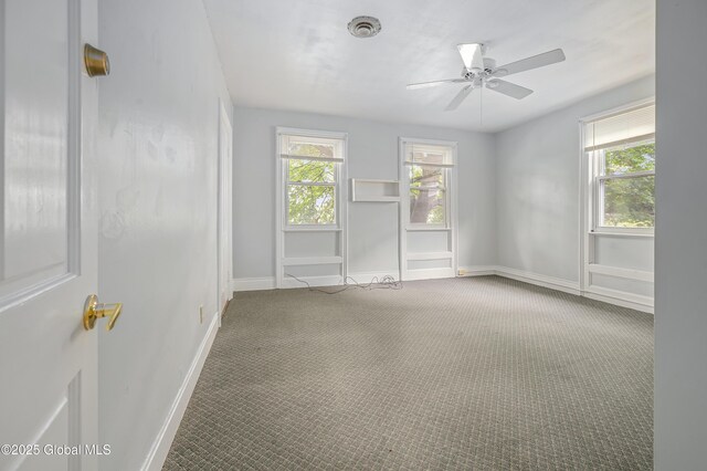 31 Cedar St, Oneonta, NY 13820 - unfurnished room with carpet floors, plenty of natural light, and a ceiling fan