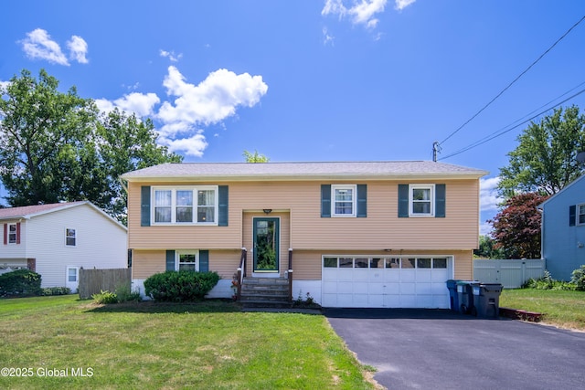 99 Fiddlers Ln, Colonie, NY 12110 - bi-level home featuring an attached garage and asphalt driveway