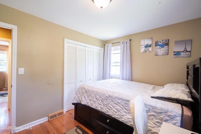 99 Fiddlers Ln, Colonie, NY 12110 - bedroom featuring light wood-style flooring and a closet