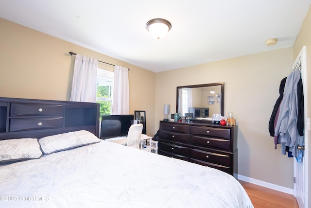 99 Fiddlers Ln, Colonie, NY 12110 - bedroom featuring wood finished floors and baseboards