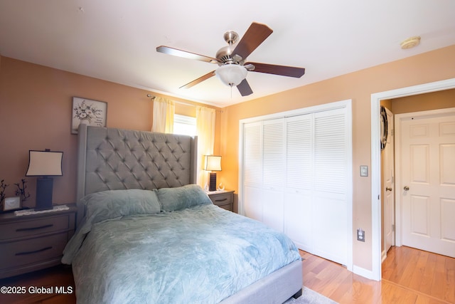 99 Fiddlers Ln, Colonie, NY 12110 - bedroom featuring a closet, light wood finished floors, and a ceiling fan